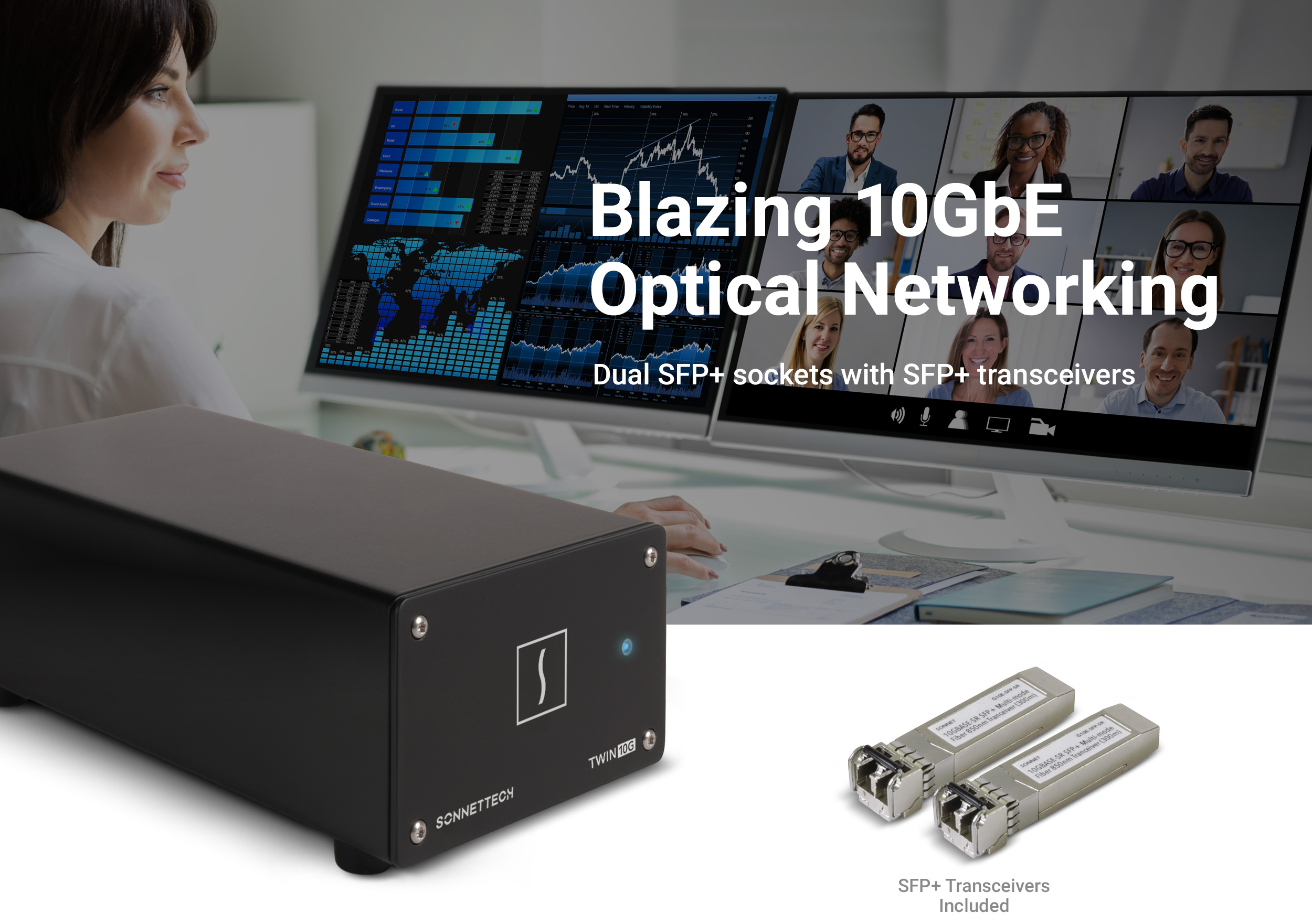 Twin10G SFP+ Thunderbolt Adapter in foreground with office worker working behind two monitors in background.